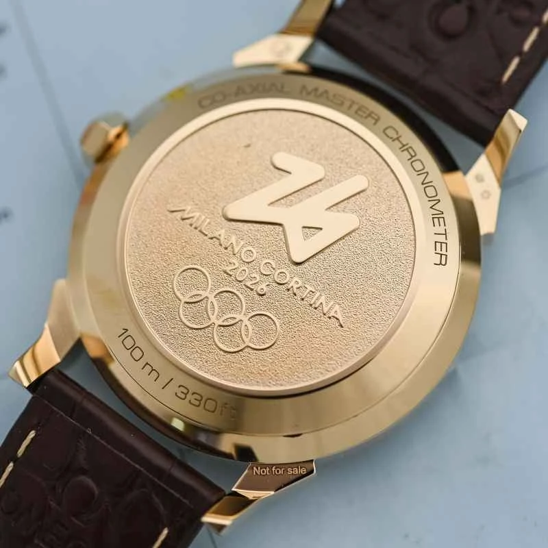 Omega-Seamaster-37mm-Milano-Cortina-2026-18k-Moonshine-Gold-White-Grand-Feu-enamel-8.jpg