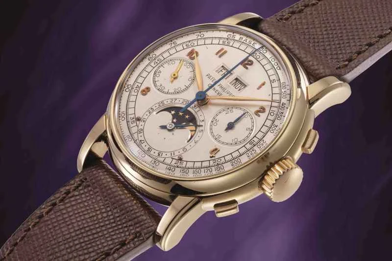 拍品213_百达翡丽型号2499第一代万年历计时黄金腕表_2.jpg